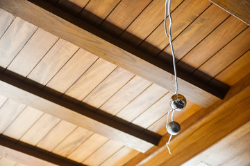 Christmas balls hanging with the wooden ceiling
