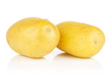 Group of two whole pale yellow potato isolated on white background