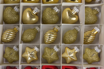 golden christmas baubles in different shapes