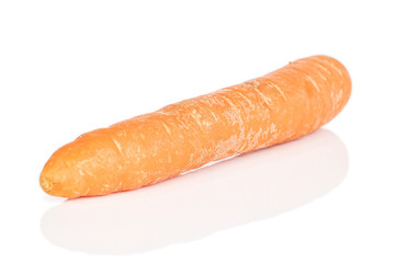 One whole fresh orange carrot isolated on white background