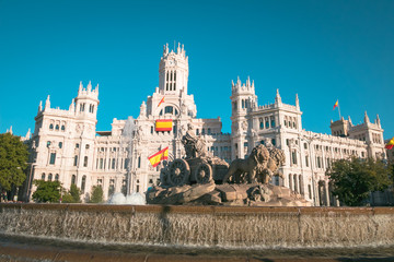 Fototapeta na wymiar Cibeles fountain and Cibeles Palace at Plaza de Cibeles in Madrid in a beautiful summer day, Spain