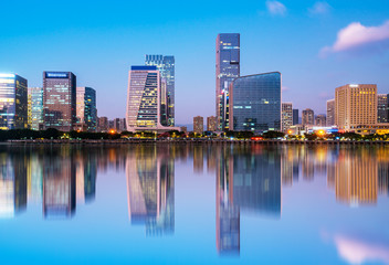 Fototapeta na wymiar Night view of modern office building in Fuzhou Financial District..