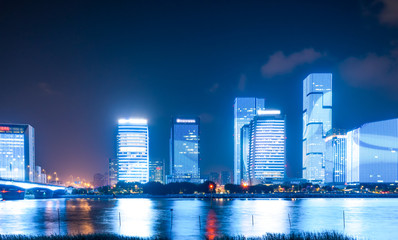 Obraz premium Night view of modern office building in Fuzhou Financial District..