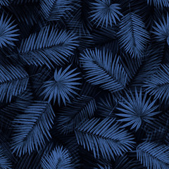 Seamless pattern of palm leaves on black background. Manual graphics. The image is in the old style. The picture is made with a simple pencil. Packaging design, postcards, pattern for fabric.