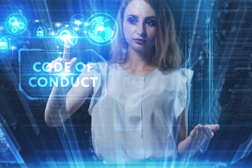Business, Technology, Internet and network concept. Young businessman working on a virtual screen of the future and sees the inscription: Code of conduct