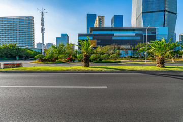Modern office buildings and urban roads in Xiamen Financial District..