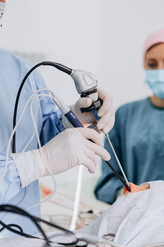 03.09.2019 Kyiv, Ukraine: Endoscopic sinus surgery. Laser vaporization of nasal concha. Modern medical equipment. team work of surgeons on real operation. Selective focus, noise effect