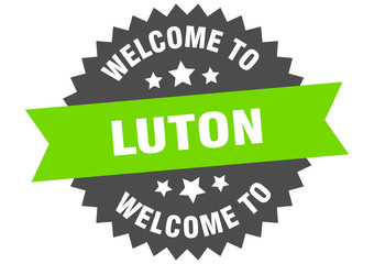 Luton sign. welcome to Luton green sticker