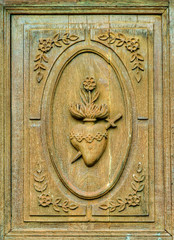 Porte de l'église de La Chaze-de-Peyre, France (détail)