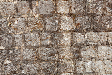 Naklejka premium old masonry, texture of stone wall, background Montenegro