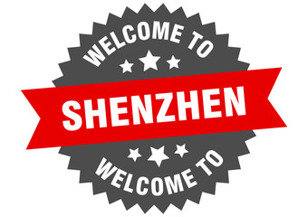 Shenzhen sign. welcome to Shenzhen red sticker