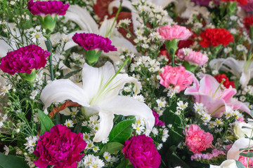 Carnation flowers and  Chrysanthemum flowers  in bouquet at flower market,pattern background,selective focus