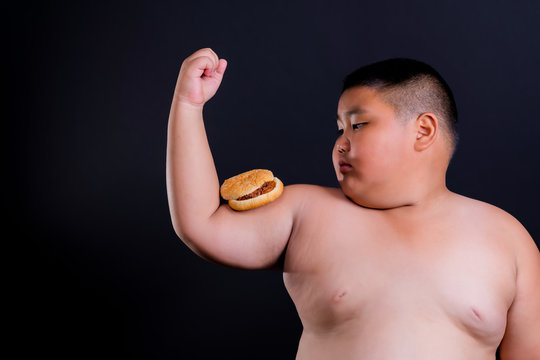 Fat boy wants to eat burgers that are placed on the biceps arms.