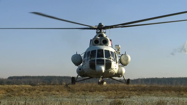 The helicopter takes off vertically on the camera