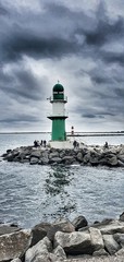 Obraz premium lighthouse on coast of sea