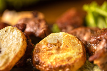 BBQ, Barbecue and Potato on skewer, close-up