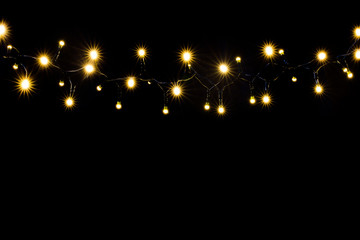 Beautiful background with Christmas light garland with copy space. Holidays concept. 