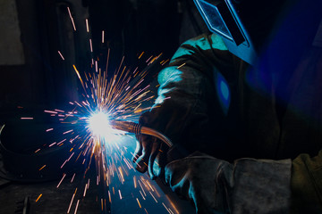 welder work, welding sparks, workshop production