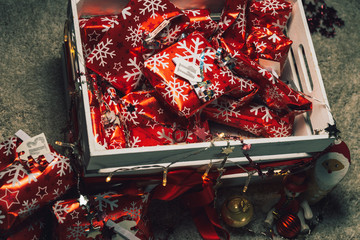 Beautiful advent calendar closeup with bright red colors and a nice decoration for christmas -  Anticipation is the greatest joy