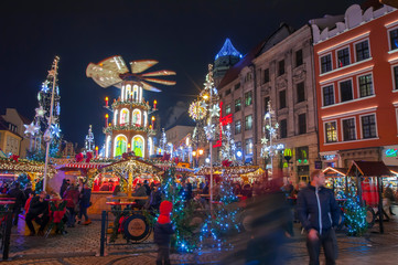 Wroclaw, Poland, October 2019. Christams market in main square Market Square in colorful illuminations and decorations