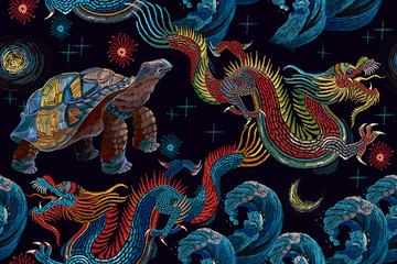 Embroidery. Chinese dragons, sea turtles and wave seamless pattern. Asian art. Oriental style. Clothes, textile design template