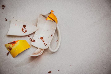 Picture of blood stained water Being harmed by sharp objects that are broken in a white background