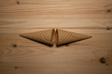  ice cream cone on a wooden table