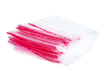 Plastic zip-lock packets isolated on white