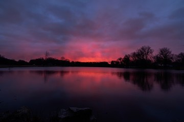Sunrise on the winter lake 