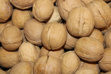 walnuts on wooden background nuts