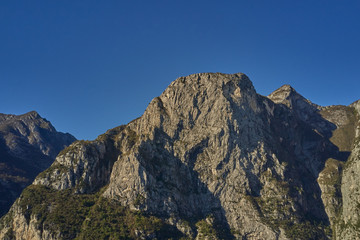 Panoramic view of the rocks in the background clear blue sky.