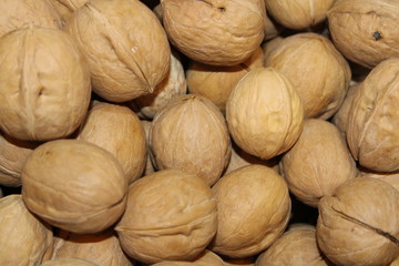 walnuts on wooden background nuts