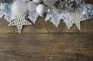 White and silver Christmas decoration on old wooden background with snowflakes, Cristmas concept