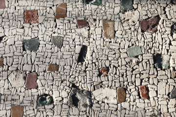 Ornamental mosaic floor covering in villa of the mysteries in Pompeii (Pompei).