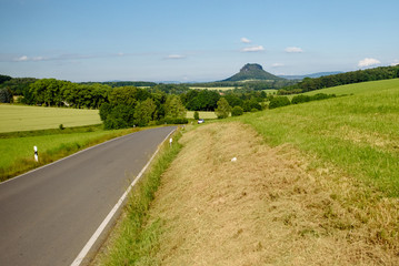 Naklejka premium Montain and road. Harvest time