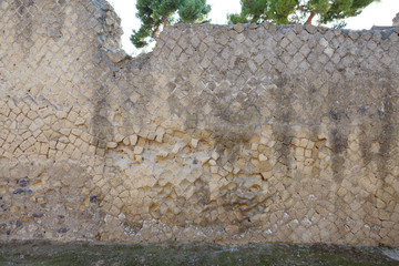 Opus reticulatum brickwork in Ancient Ercolano (Herculaneum) city ruins.