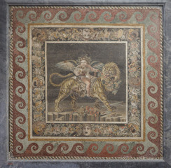 Pompeii - Eros-Bacchus on Tiger. Ancient Roman mosaic.  Naples, Italy