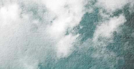 Double exposure of cloud and sky of paper texture for background Abstract,postcard nature art pastel style,soft and blur focus.