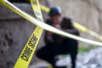 Vintage detective photographating the crime scene