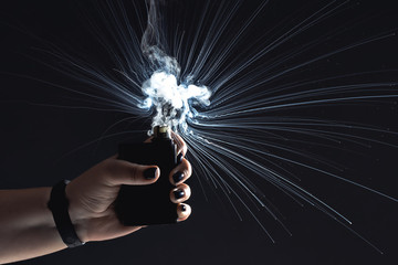 woman holding a mod vape explosion