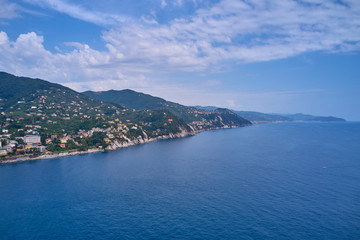 Obraz premium Aerial view of the harbor city of Santa Margherita Ligure, Italy. Yachts, boats, ships in the parking lot in the bay of the resort town. Early in the morning