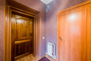 Russia, Moscow- July 25, 2019: interior room apartment. standard repair decoration in hostel. room doors, repair corridor