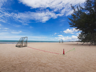 football goal on beach with sea background - 306731653