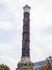 Fototapeta na wymiar The Column of Constantine (Turkish: Cemberlitas Sutunu), also known as the Burnt Stone or the Burnt Pillar. In Istanbul, Turkey