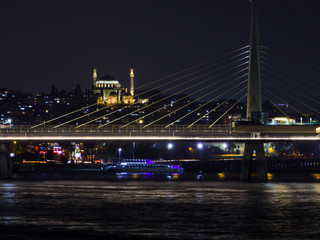 Fototapeta premium View of the Halic Bridge by night. In Istanbul, Turkey