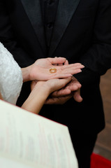 wedding rings on hands