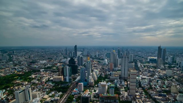 time lapse of unidentified people with panoramic view on 78th floor at King Power Mahanakhon building rooftop, Bangkok, Thailand