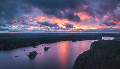 Lake with islands and a purple sunset, aerial panorama
