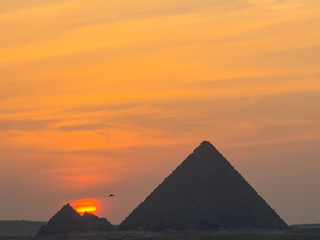 View of the Pyramids of Giza at sunset. In Cairo, Egypt