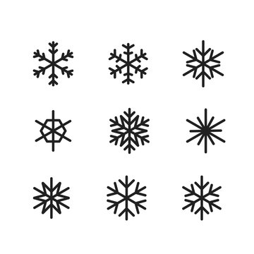 Different silhouettes of winter snowflakes vector clipart
